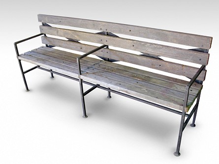 A bench made of wood and metal on a white background.