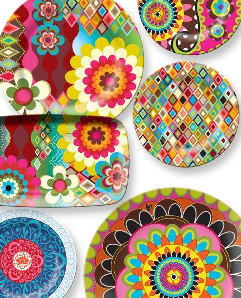 A set of colorful plates with designs on them.