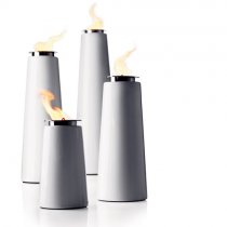 Three white candle holders with flames on them.