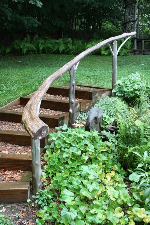 natural wood handrail in a garden