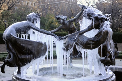 garden sculpture with ice frozen 