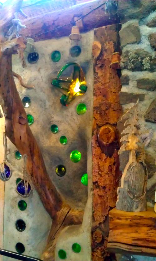 Beautiful Cordwood and Recycled Bottle Bottle Construction of the Peace of Art Cafe in Del Norte, CO. 