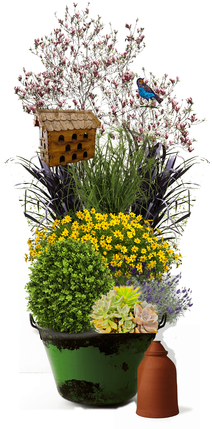 A green pot filled with planters and a birdhouse.