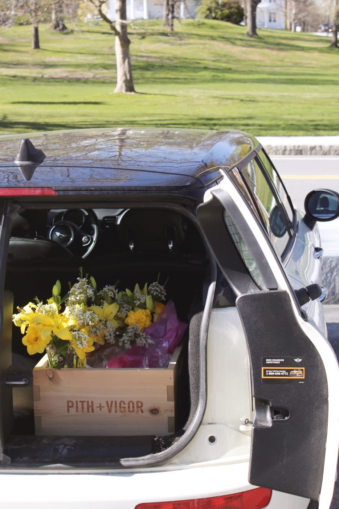 flower bouquets in the back of a mini