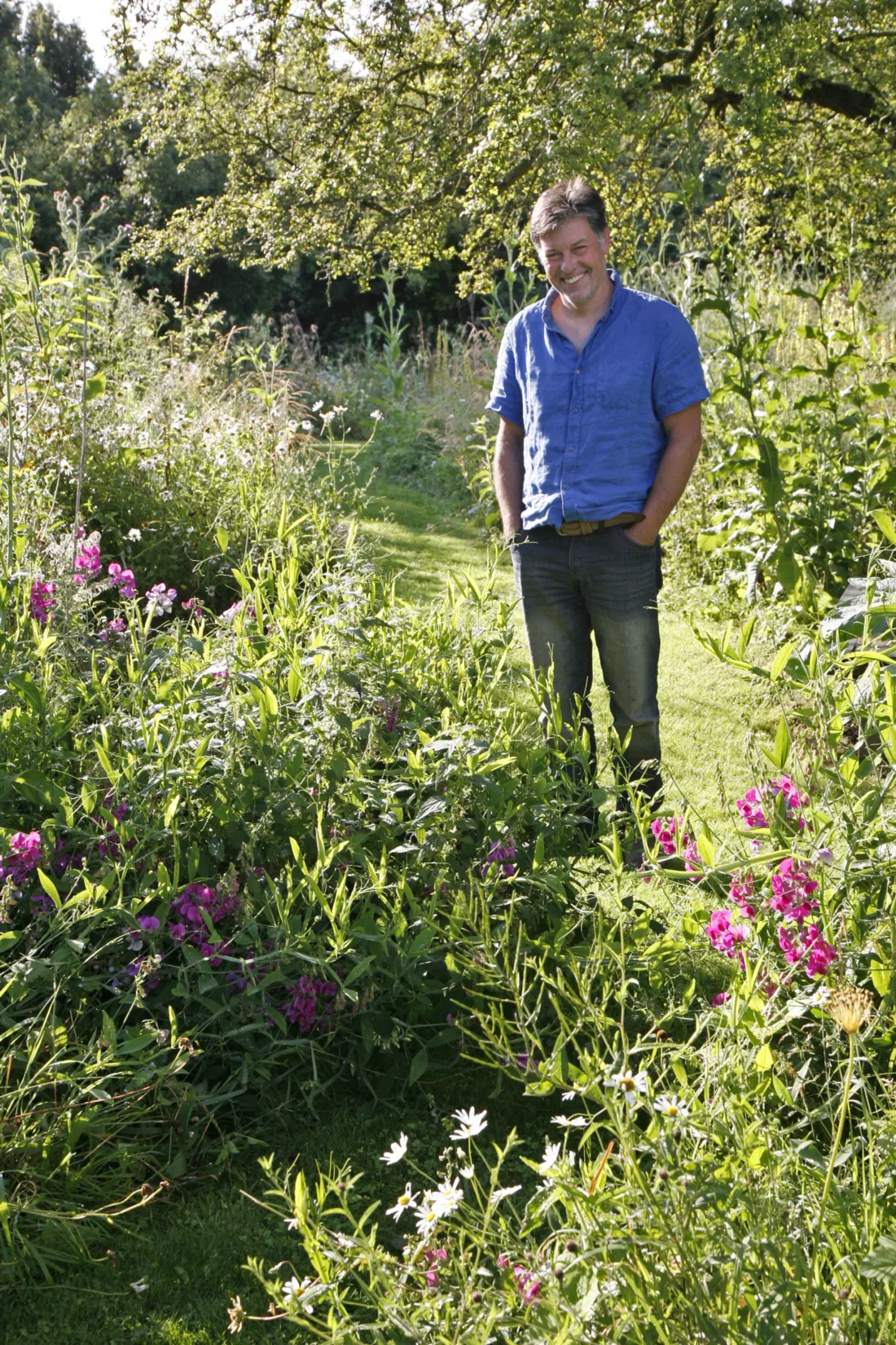 John Little in his garden at hilldrop in essex england