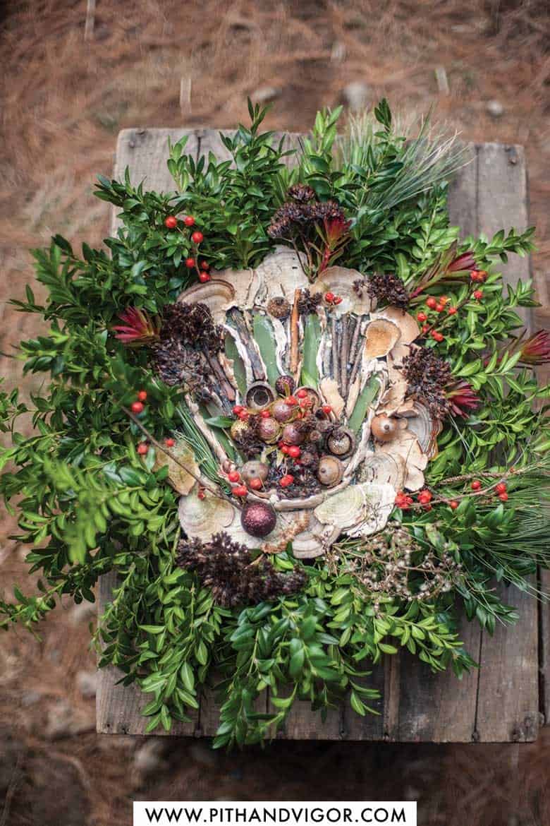 The Hand Wreath

Holly, mushrooms, acorns, boxwood, dried sedum and twigs make this hand wreath.