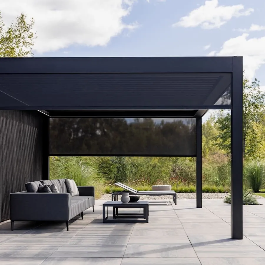 An outdoor patio with a black pergola.
