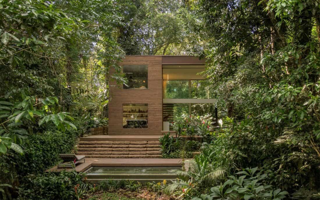 A house surrounded by trees. Design by arthur casas in brazil. 